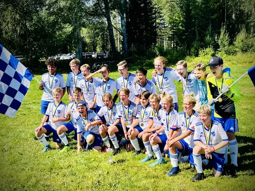 Glada spelare efter att ha klarat av gruppspelet och ännu gladare efter prisutdelningen