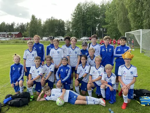 Glada spelare efter att ha klarat av gruppspelet och ännu gladare efter prisutdelningen