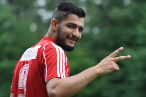 Ett Ax-plock av matchbilder signerat "sportchefen, Hossein och Chippen!