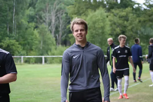 Ett Ax-plock av matchbilder signerat "sportchefen, Hossein och Chippen!