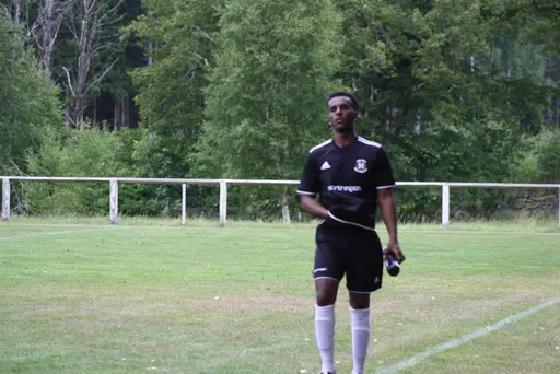 Ett Ax-plock av matchbilder signerat "sportchefen, Hossein och Chippen!